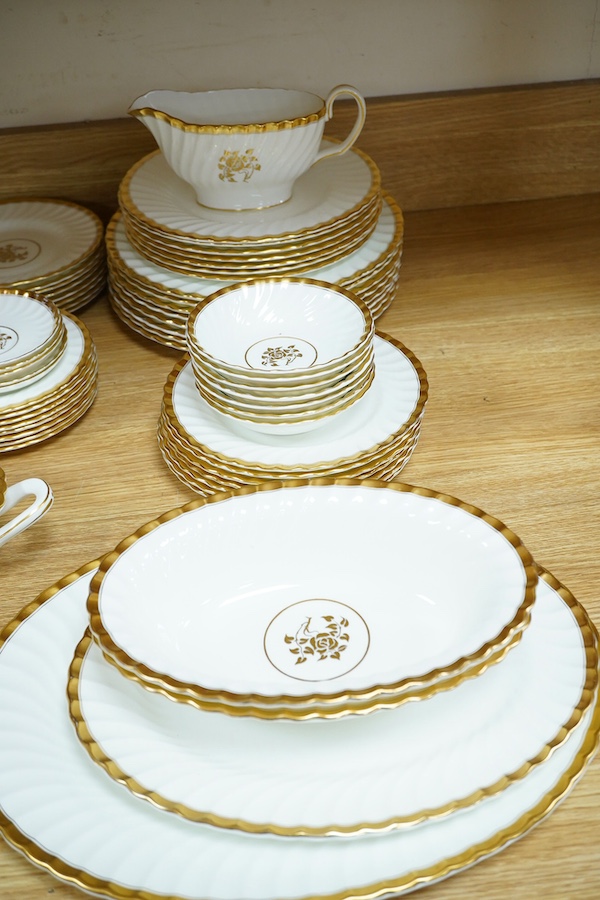 An extensive Minton ‘gold rose’ dinner and tea service. Condition - fair to good, tureen cracked